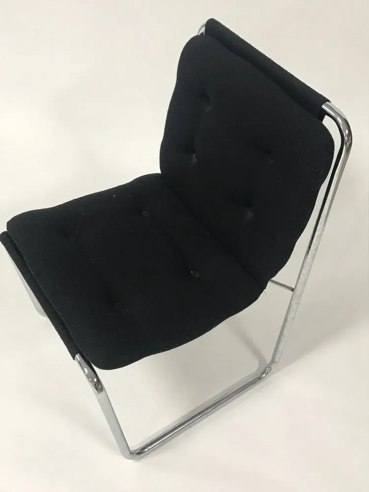 Pair of black upholstered tubular steel Cosco sling chairs